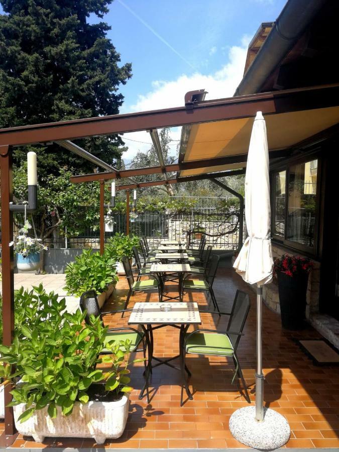 Albergo Al Pescatore Бренцоне-суль-Гарда Екстер'єр фото